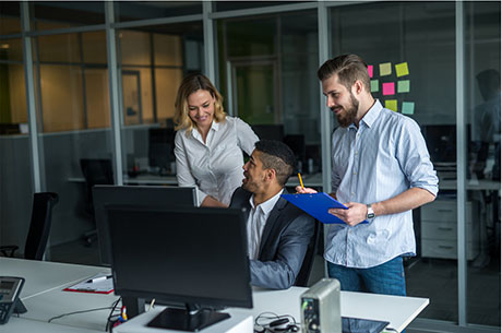 Office workers conducting cybersecurity testing